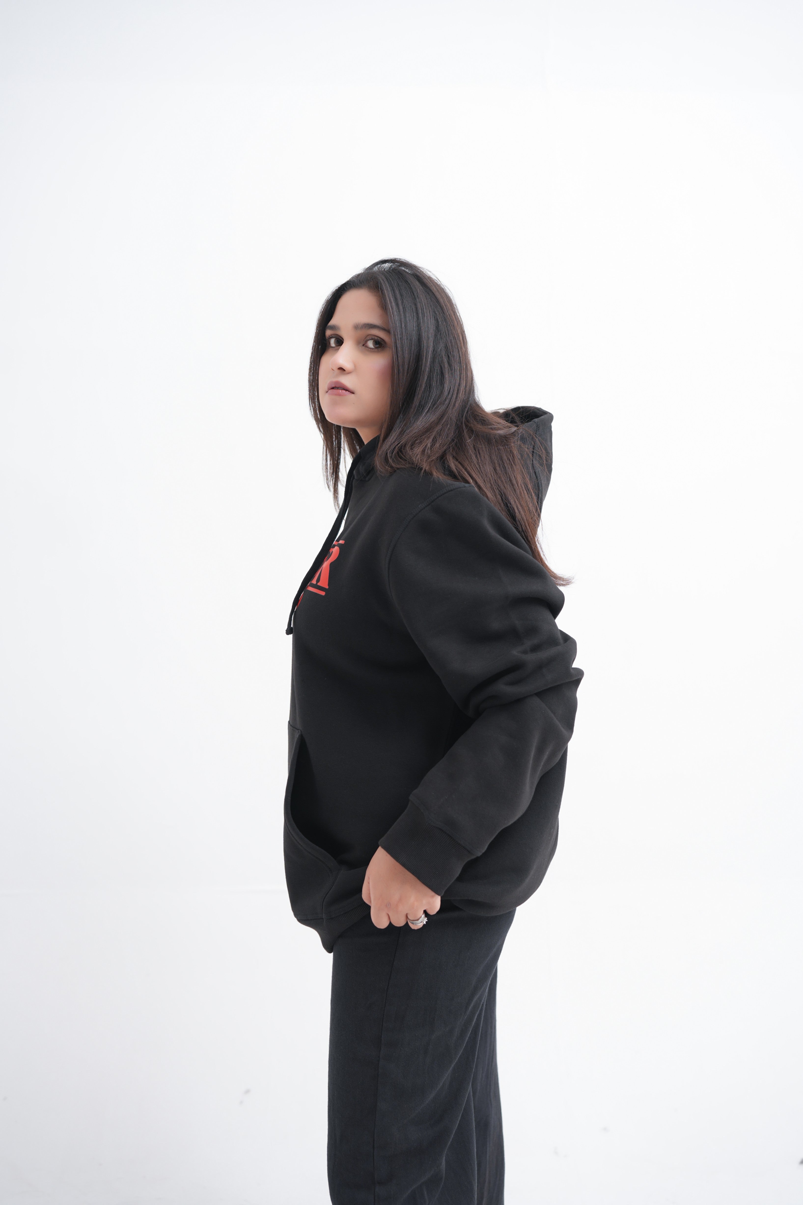 Unisex black hoodie with a Stranger Things graphic on the chest: