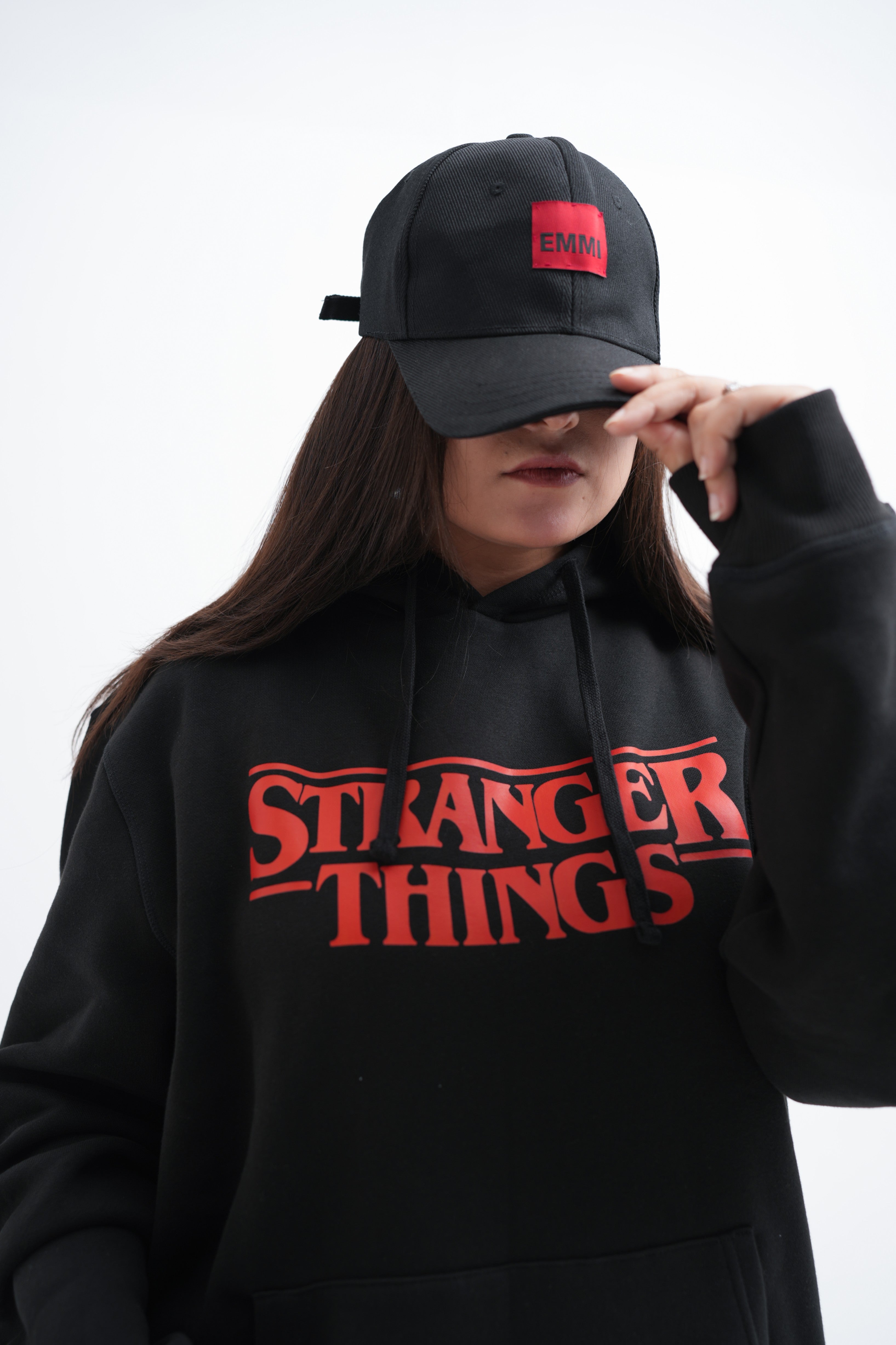 Unisex black hoodie with a Stranger Things graphic on the chest: